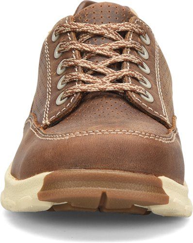 Front view of women's brown and tan oxford round toe work shoe with laces and perforated top leather