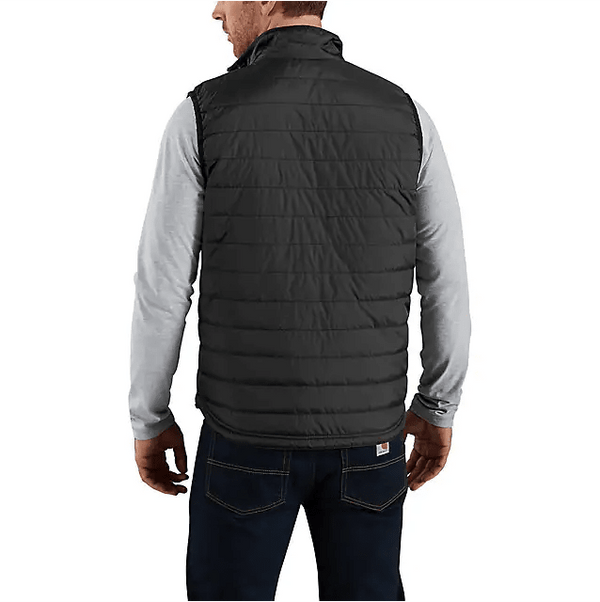 back of man wearing insulated black vest over grey long sleeve shirt