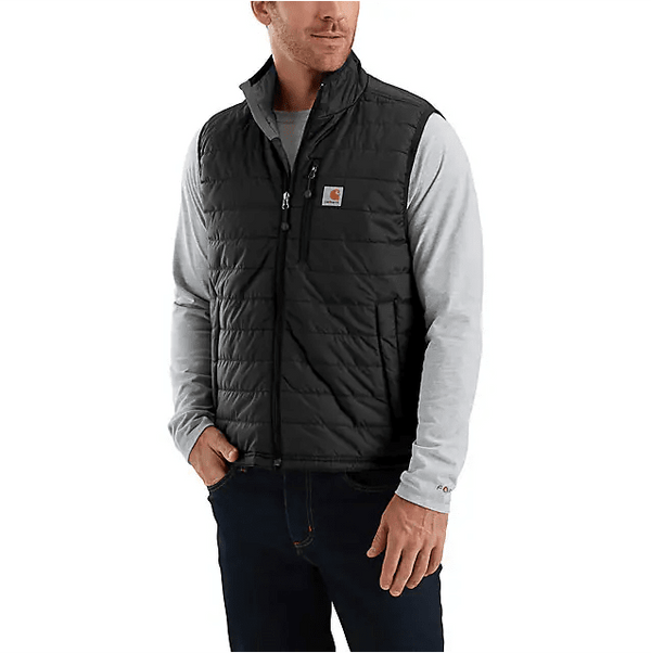 man wearing insulated black vest over grey long sleeve shirt