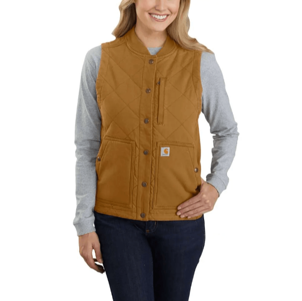 woman wearing khaki canvas insulated vest over grey long sleeve shirt