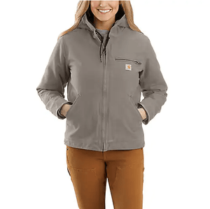 woman weaing grey insulated jacket and brown pants