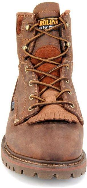 front of light brown distressed work boot with brown sole