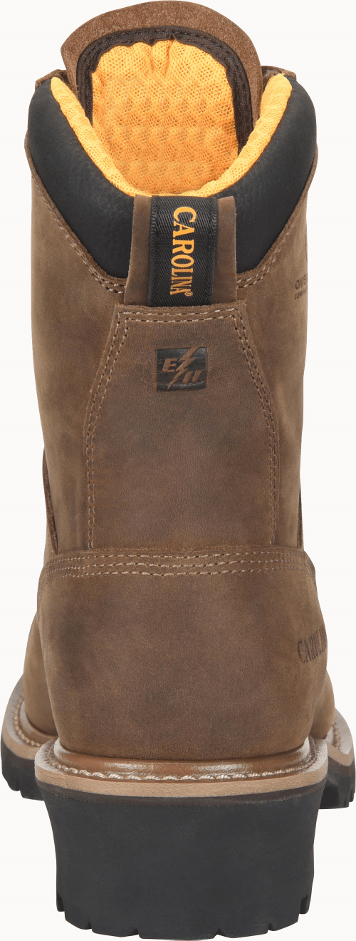 back of brown hightop work boot with black sole