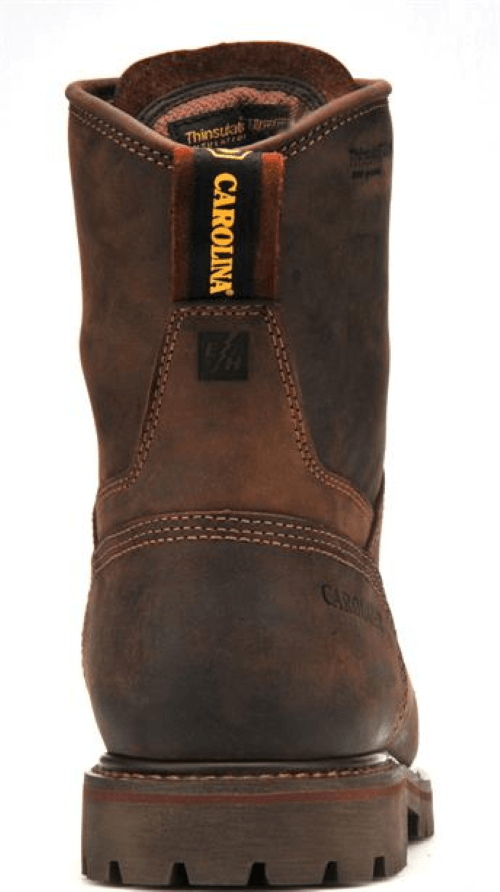 back of red-brown hightop boot with brown sole