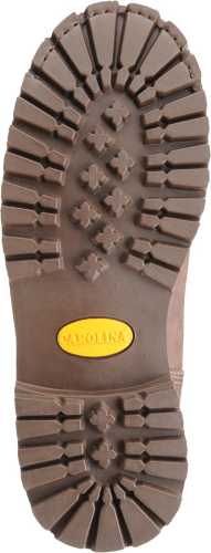 brown sole on boot with yellow logo
