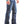 Load image into Gallery viewer, side view of man wearing blue jeans with large silver belt buckle and boots
