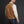 Load image into Gallery viewer, rear view of man wearing light brown vest over white long sleeve shirt
