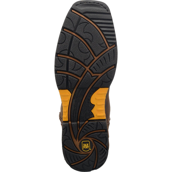 black, yellow, and brown sole on boot with yellow logo on heel