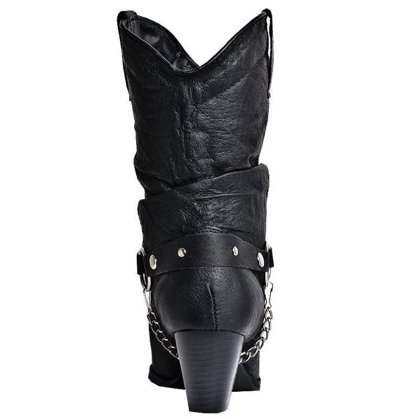 rear view of black cowgirl boot with silver chain hooked on leather belt with metal stars on it