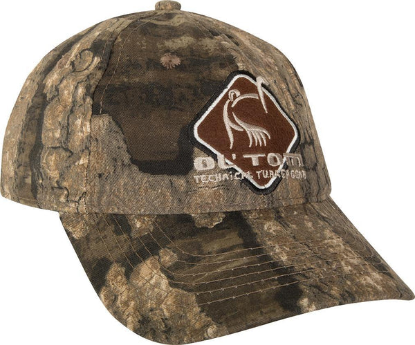 Camo hat with brown diamond shaped patch on front 
