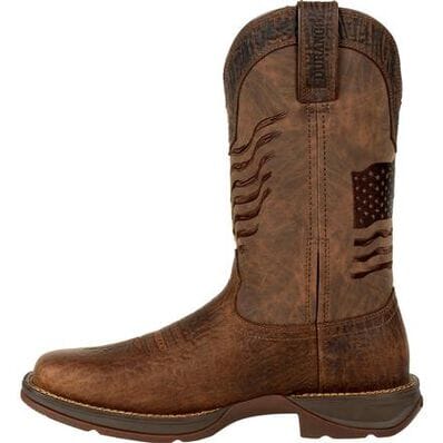 left side of brown distressed pull on western cowboy boot with American flag embroidered across the shaft