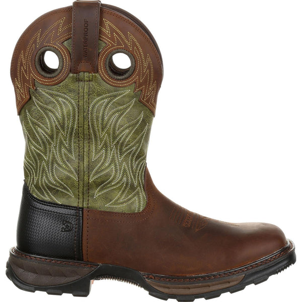 side view of cowboy boot with green shaft and white embroidery with brown vamp