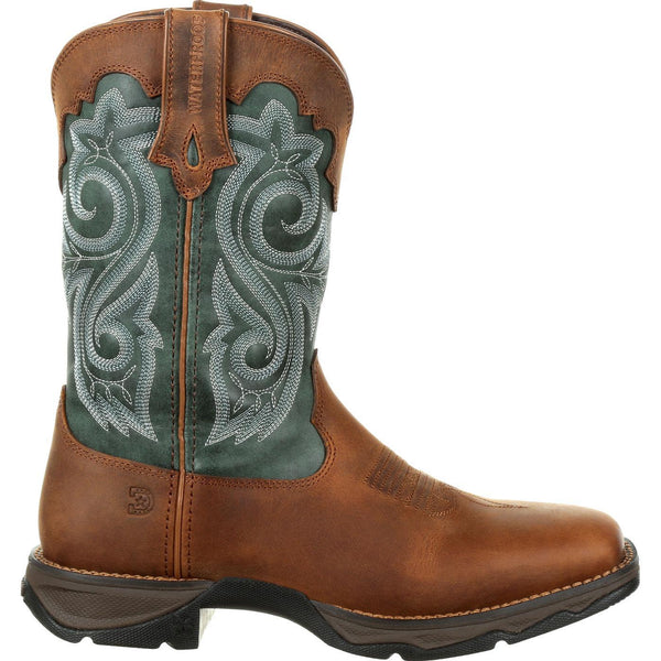 side view of light brown cowgirl work boot with green shaft and white embroidery