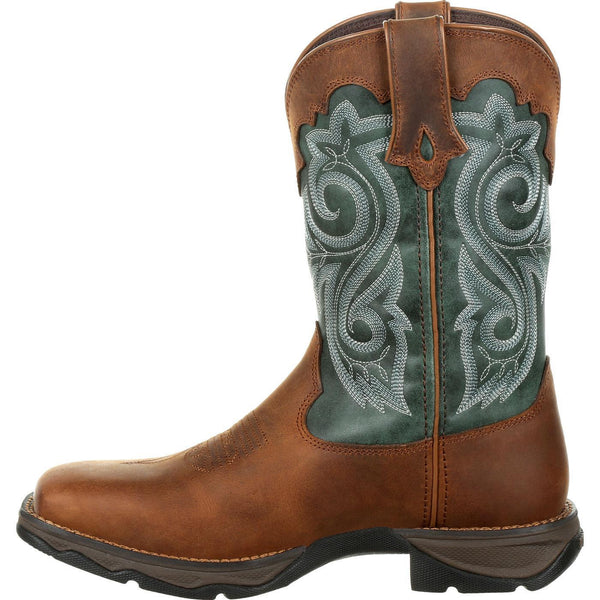 side of light brown cowgirl work boot with green shaft and white embroidery