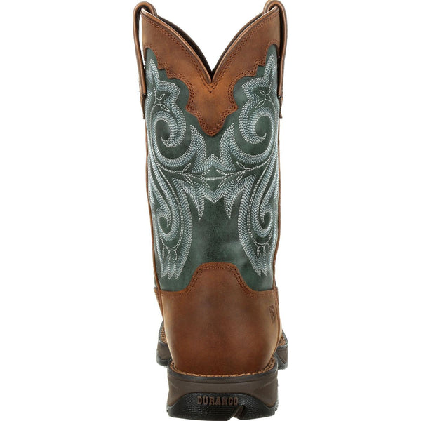 back of light brown cowgirl work boot with green shaft and white embroidery