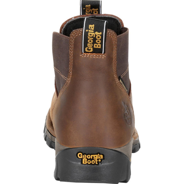 back of mid-top pull on brown work boot with round toe
