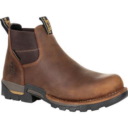 angled view of mid-top pull on brown work boot with round toe