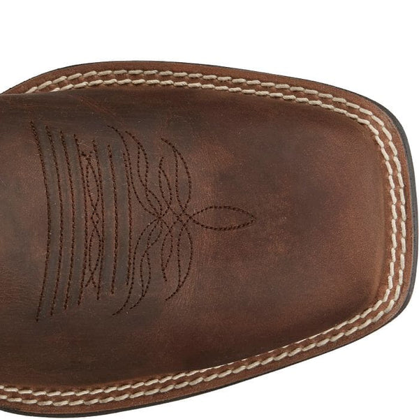 Detailed close up view wide square toe of men's dark brown western boot with brown embroidered design and white stitching.