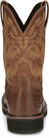 back of brown cowboy boot with light brown embroidery and black sole