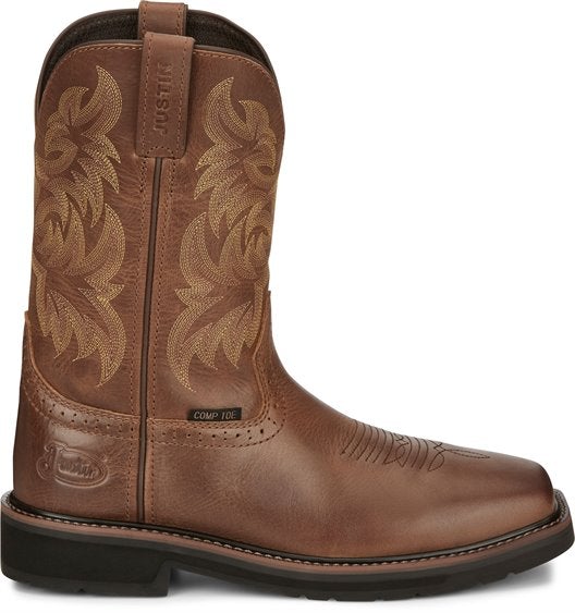 side of brown cowboy boot with light brown embroidery and black sole