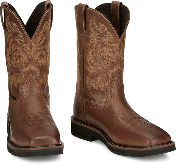 brown cowboy boots with light brown embroidery and black sole