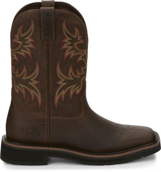 side of dark brown cowboy boot with red and light brown embroidery