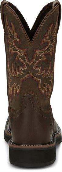 back of dark brown cowboy boot with red and light brown embroidery