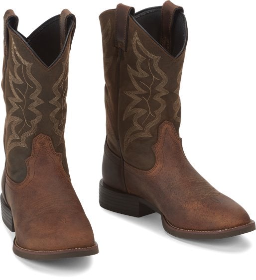 two cowboy boots with dark brown shaft and light brown vamp and light brown embroidery