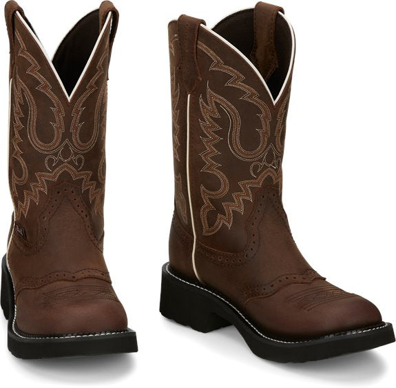 brown traditional round toe cowgirl boots with ivory and rust stitch pattern and white seam accents