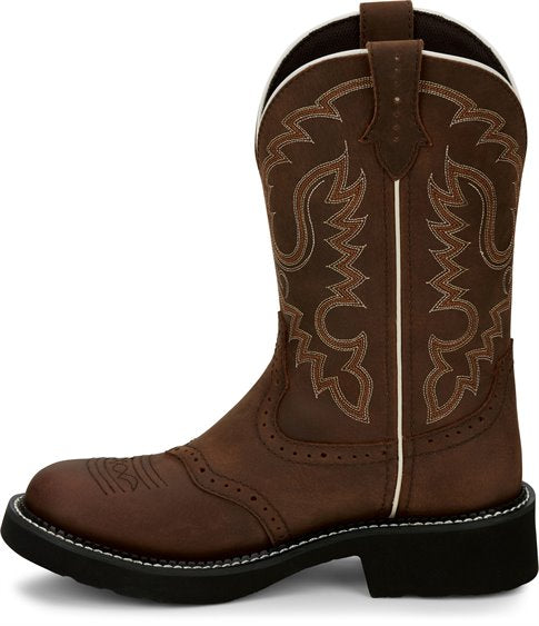 side view of brown traditional round toe cowgirl boot with ivory and rust stitch pattern and white seam accents