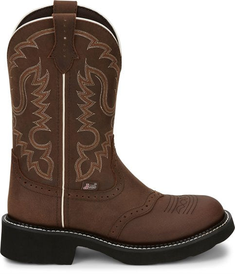side view of brown traditional round toe cowgirl boot with ivory and rust stitch pattern and white seam accents