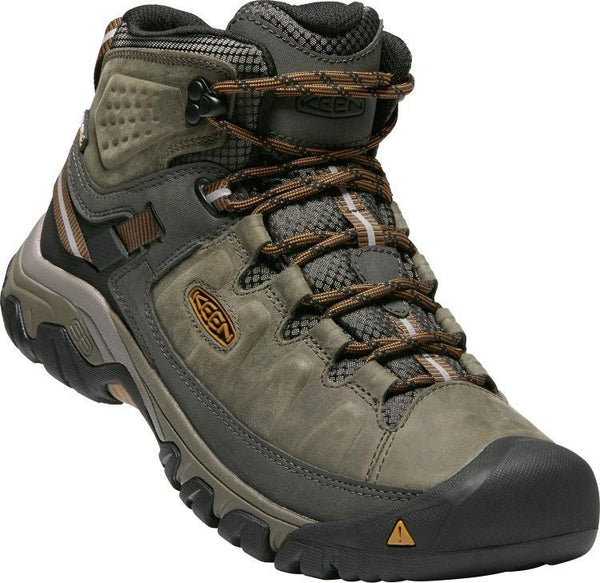 angled view of grey/brown hiking boot with brown laces and black sole