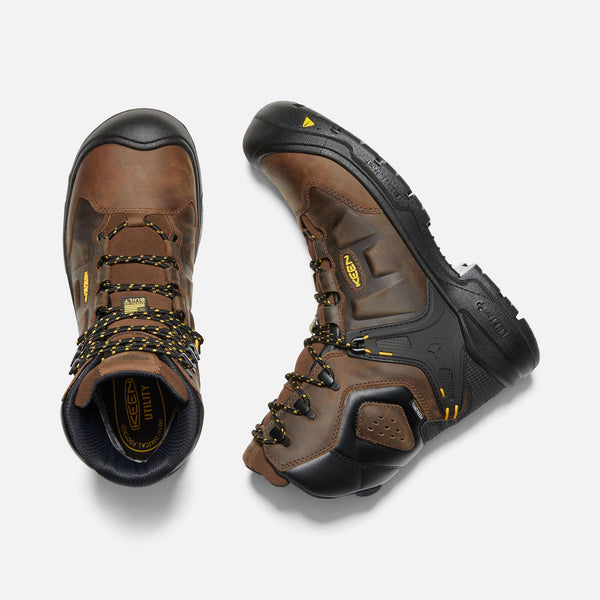 top view and side view of brown hightop boot with yellow and black laces, black toe guard and sole, black eyelets
