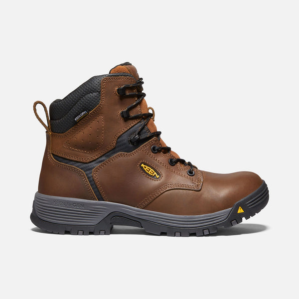 tan hightop boot with black laces and eyelets, grey and black sole