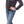 Load image into Gallery viewer, woman with hands on waist wearing black and white polka dot long sleeve shirt with leopard print collar and cuffs, light blue denim jeans and tan boots.
