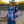 Load image into Gallery viewer, woman outside wearing black and white tie dye long sleeve button up shirt with turquoise accents and white cowgirl hat

