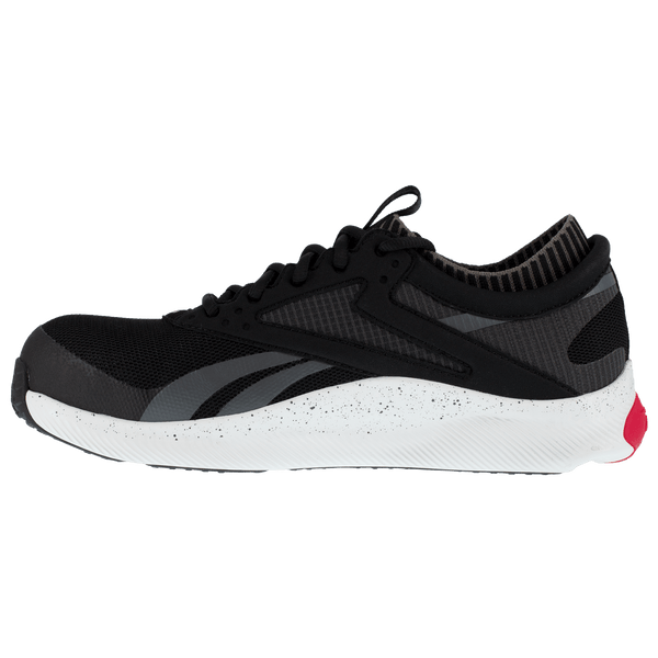 alternate side of black and grey tennis shoe style lace up work shoe with white and red sole