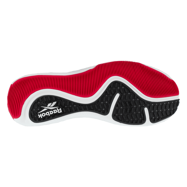 red, black, and white sole of athletic work shoe with Reebok log on bottom of heel