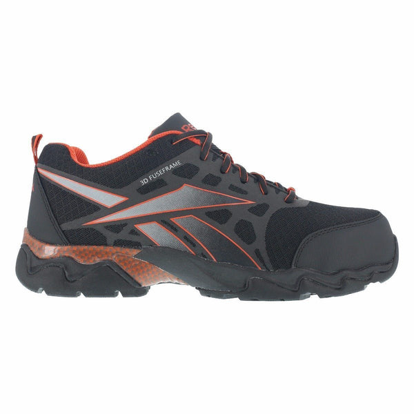 side of black shoe with grey and orange logo on side, black and orange laces, orange lining