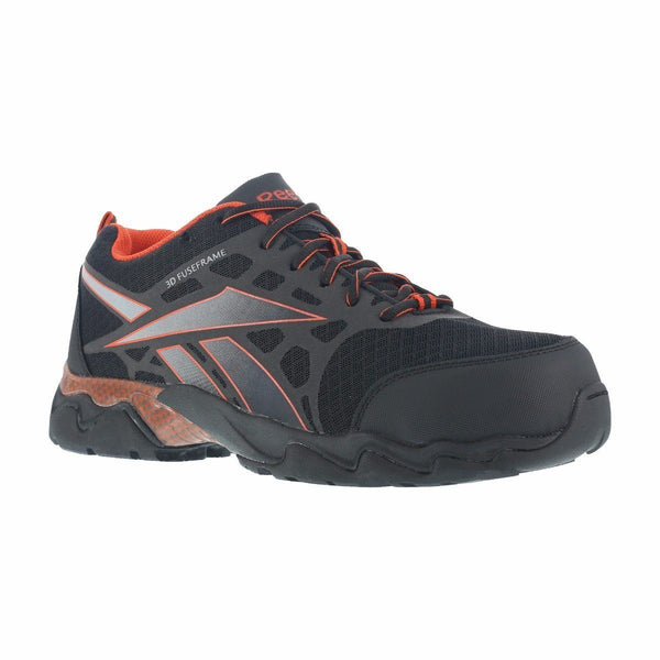 black shoe with grey and orange logo on side, black and orange laces, orange lining