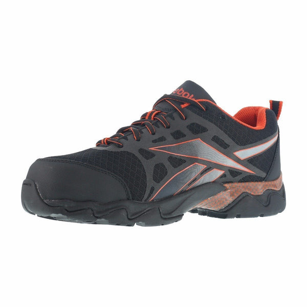 angled view of black shoe with grey and orange logo on side, black and orange laces, orange lining