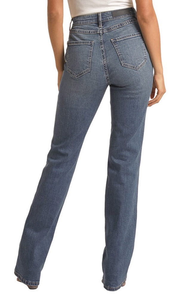 back view of woman wearing medium blue button closure denim jeans, with cream top tucked in.