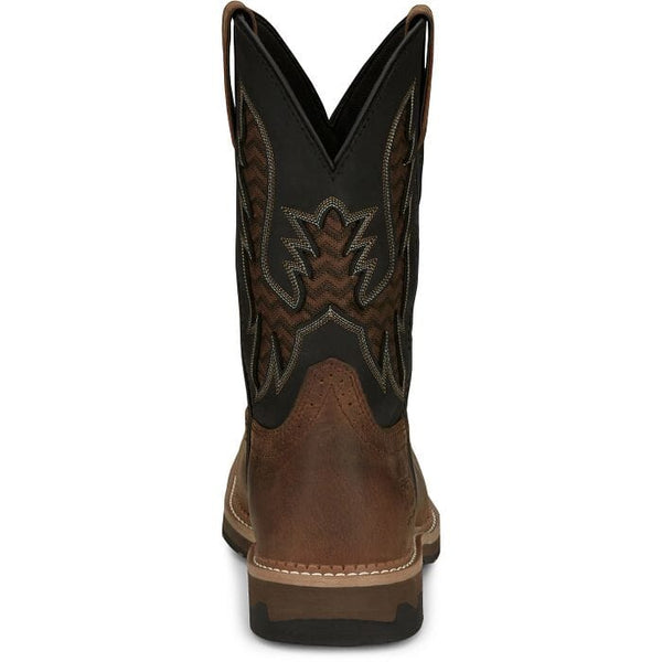 back view of mens western square toe work boot with brown vamp and black shaft with brown and black vent and white and tan embroidery