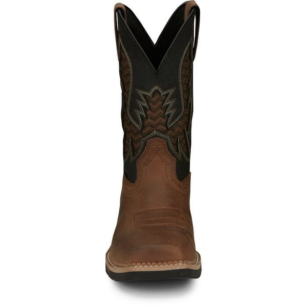 front view of mens western square toe work boot with brown vamp and black shaft with brown and black vent and white and tan embroidery