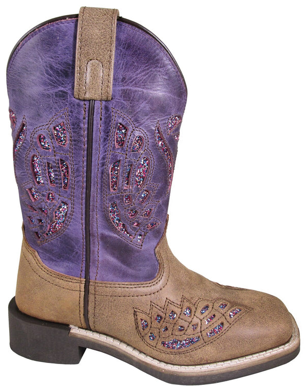 right side of kids square toe pull on cowgirl boot with brown vamp, purple shaft, and glitter underlay in cut out designs