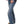 Load image into Gallery viewer, woman wearing blue jeans with leopard print vented hem and black polka dot shirt with thumbs in front pockets
