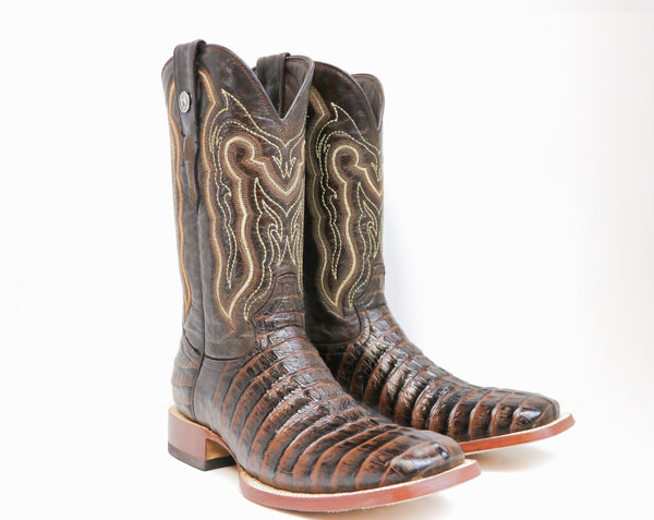 two dark brown cowboy boots with alligator skin vamp and yellow, white, and brown embroidery on shaft