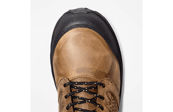 detailed view of mens light brown logger boot with black toe and laces.
