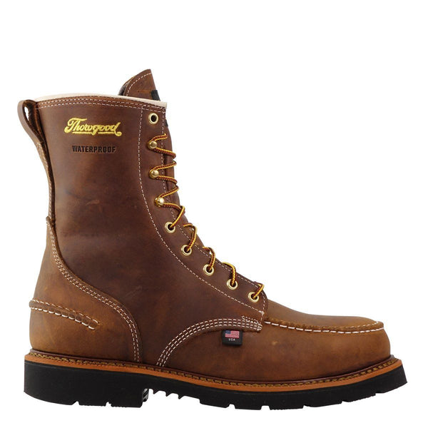 mens brown logger boot with black soles white stitching and yellow thorogood logo right side view
