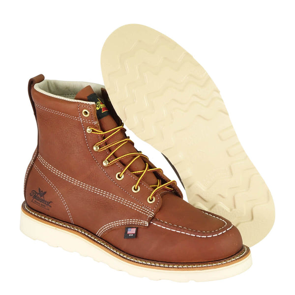 brown/red mid-rise boot with yellow and brown laces and white sole